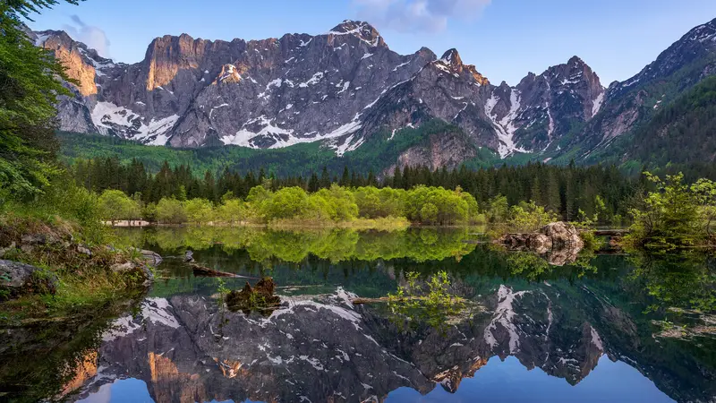 The Fusine lakes and Mount Mangart at sunset